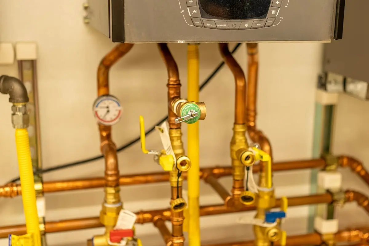 Licensed technician providing Water Heater Installation for a homeowner in Caro